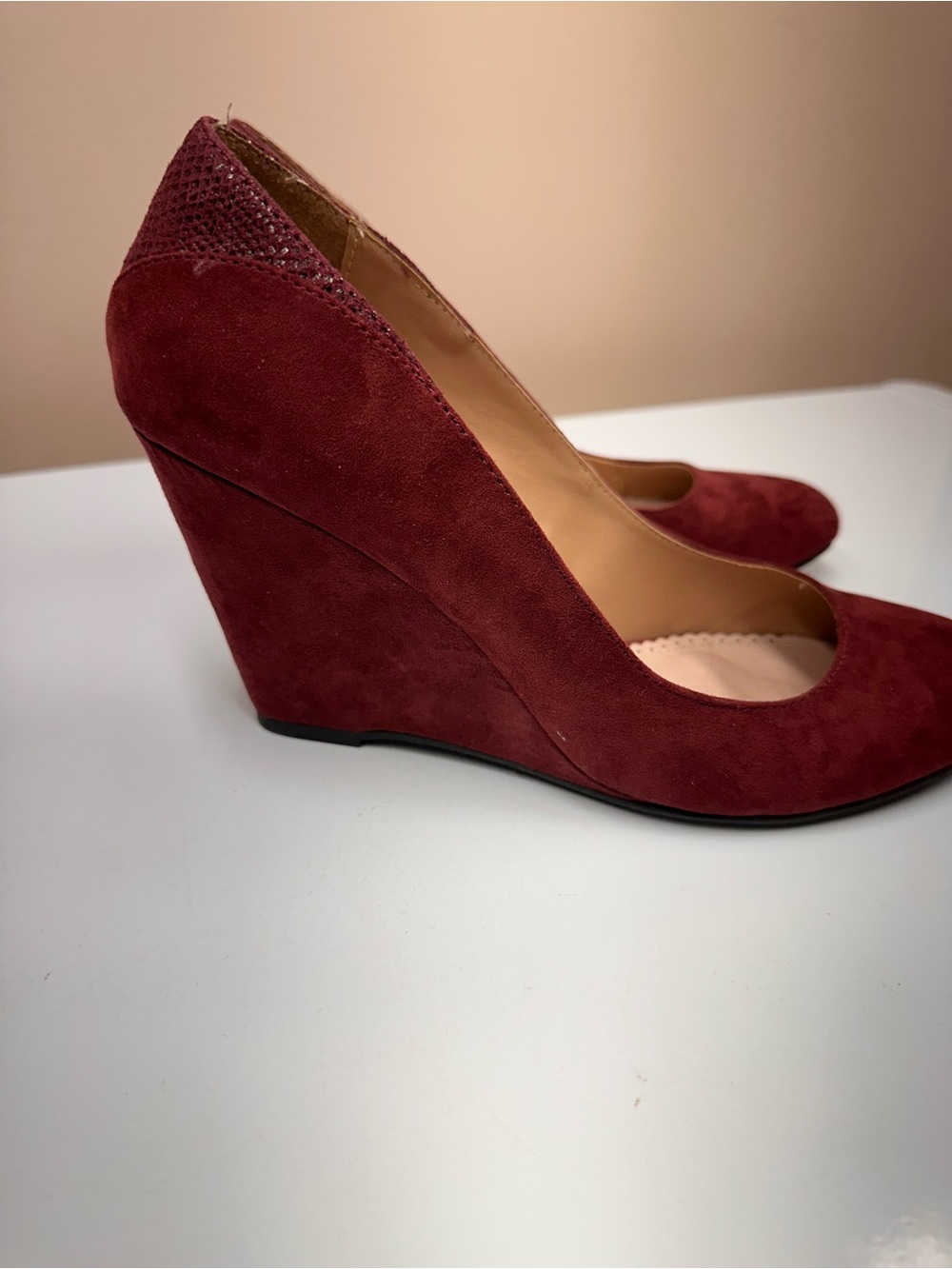 Restricted Burgundy Suede Wedge Pumps